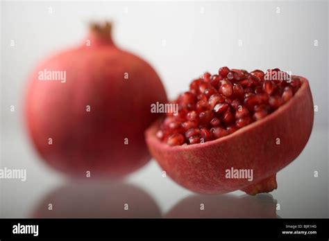 Pomegranate and a half Stock Photo - Alamy