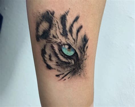 Pin on Tattoos in 2024 | Tiger eyes tattoo, Leopard tattoos, Eye tattoo