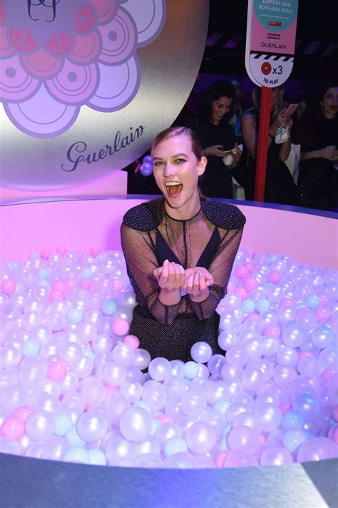 Karlie Kloss risked a major wardrobe malfunction at aptly named Naked