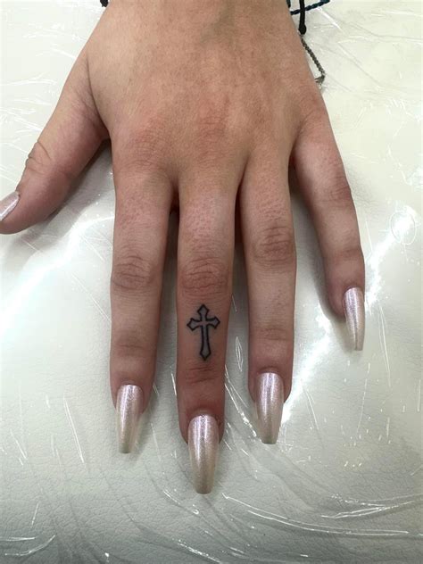 cross hands tattoo 9