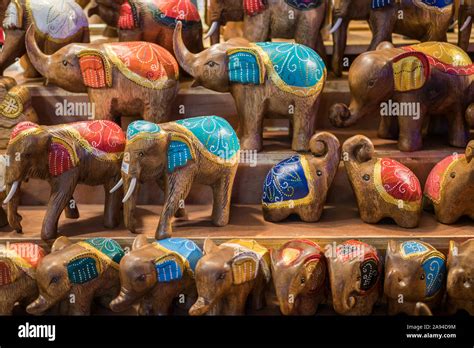 Close-up view of the carved wooden elephants selling in the souvenirs ...