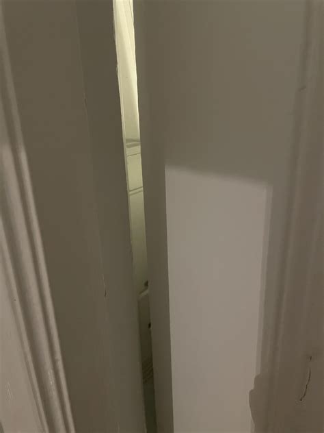 My bathroom door is stuck against the door of my dryer. : r/fixit