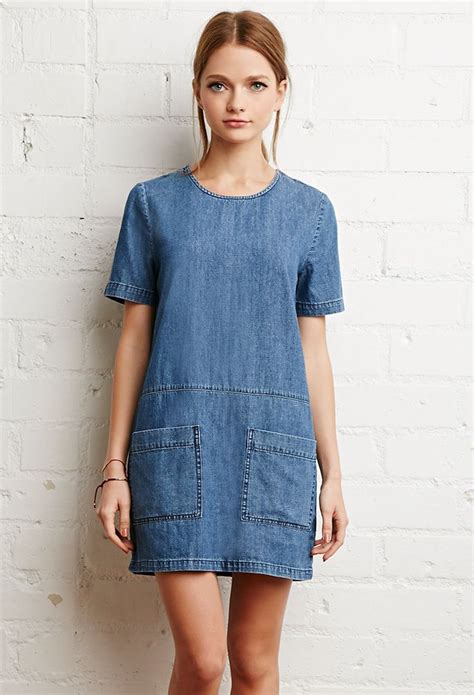 7 Denim Dresses You Need In Your Closet Right Now
