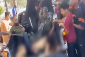 israel hamas war woman paraded naked  militants identified  german
