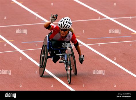 Switzerland's Edith Hunkeler celebrates winning gold in the 800m ...