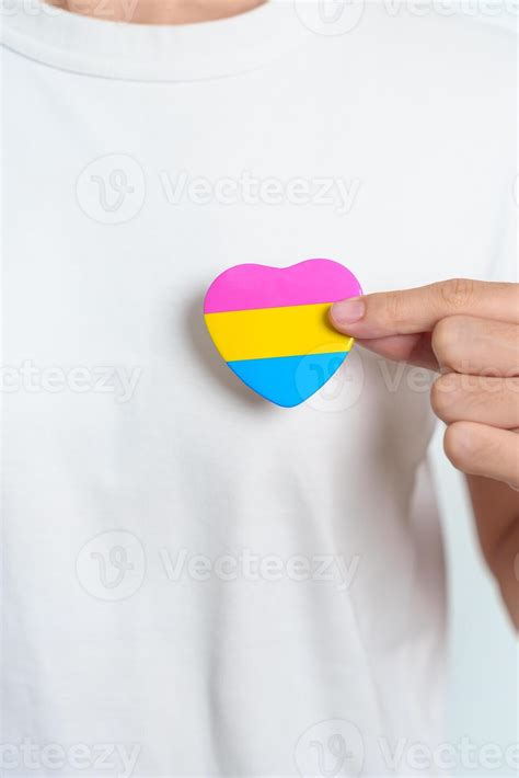 Pansexual Pride Day and LGBT pride month concept. hand holding pink