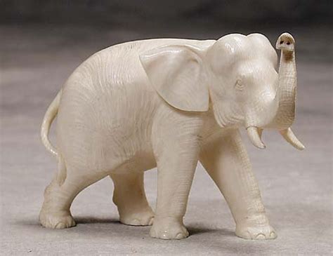 Lot - Carved ivory elephant 20th century