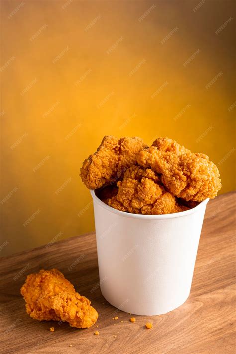 Premium Photo | Crispy fried chicken in the bucket Chicken bucket