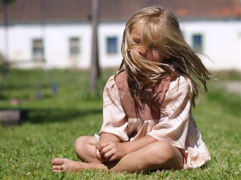 Barefoot girl on grass stock image. Image of barefeet - 19745367