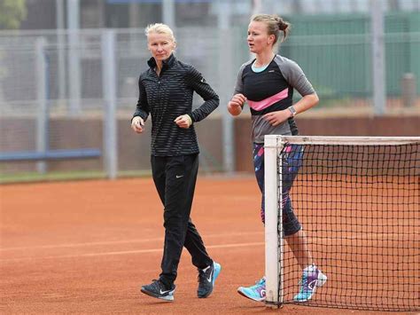 Who is Barbora Krejcikova's coach Pavel Motl?