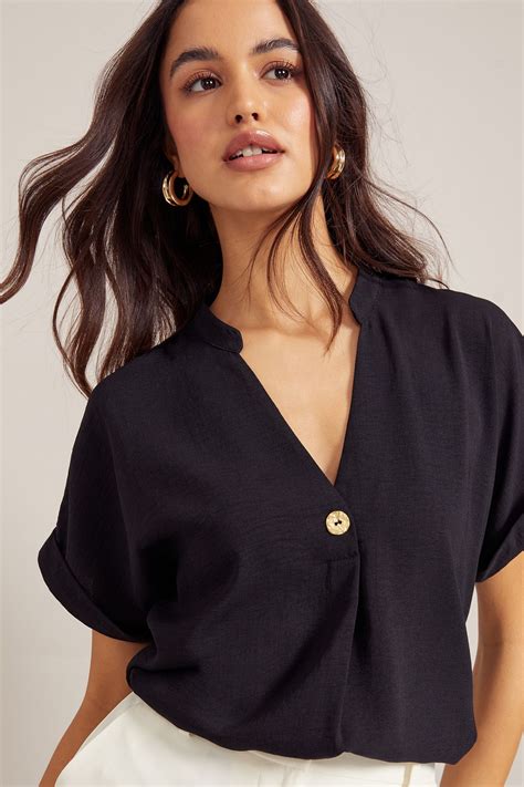 Buy Friends Like These Black V Neck Roll Sleeve Button Blouse from the