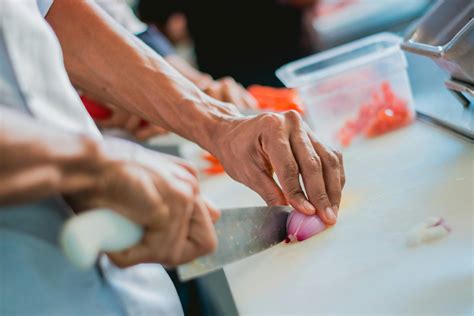 man chopping vegetable  stock photo