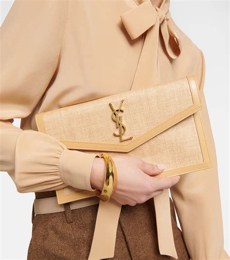 uptown raffia  leather clutch  neutrals saint laurent mytheresa