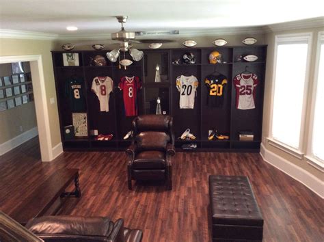 NFL Clients mancave ,career memorabilia, made to look like an NFL