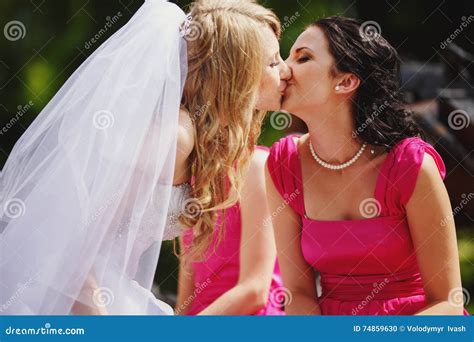 2 Brides Kissing – Telegraph