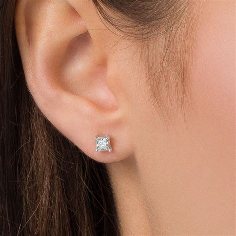 1/5 CT. T.W. Princess-Cut Diamond Solitaire Stud Earrings in Sterling ...