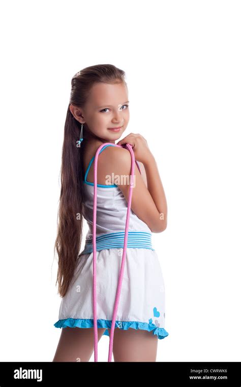 Young teen gymnast posing with skipping rope isolated Stock Photo ...
