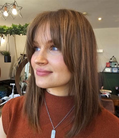 23 Chic Brow-Skimming Bangs That Flatter Every Face Shape - Kappers