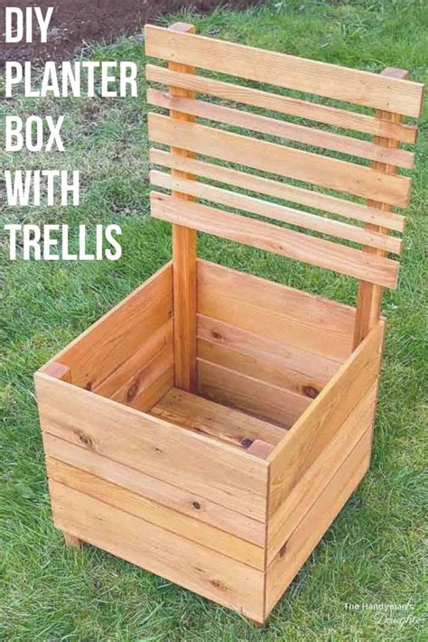 a wooden planter box with trelliss on the grass and text overlay that ...