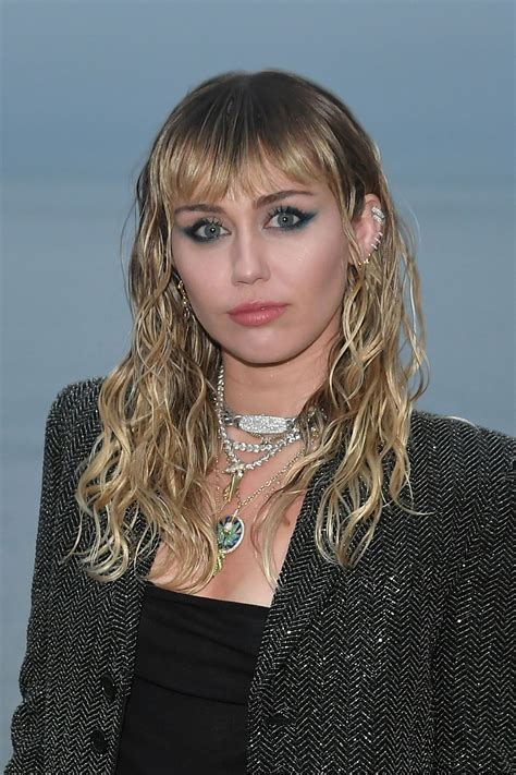 Miley Cyrus Does Grunge Beach Hair at Saint Laurent’s Malibu Boardwalk