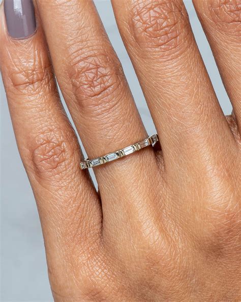 baguette band with emerald cut diamond 8