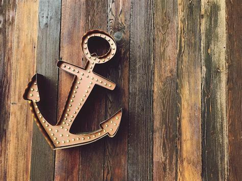 premium photo close   anchor  wooden table