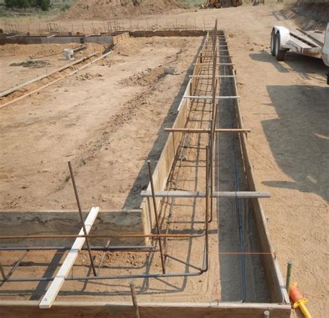 Using vertical rebar to suspend footing rebar for CMU stem wall ...