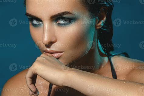 Sexy woman in the pool at night 16200856 Stock Photo at Vecteezy
