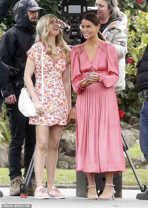 Neighbours' stars Jodi Gordon and April Rose Pengilly are all smiles as ...