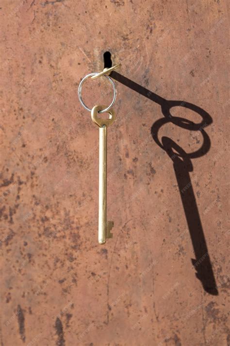 premium photo keys    gate  key   keyhole