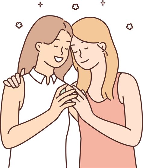 Loving lesbian couple of two women gently hugging and enjoying romantic