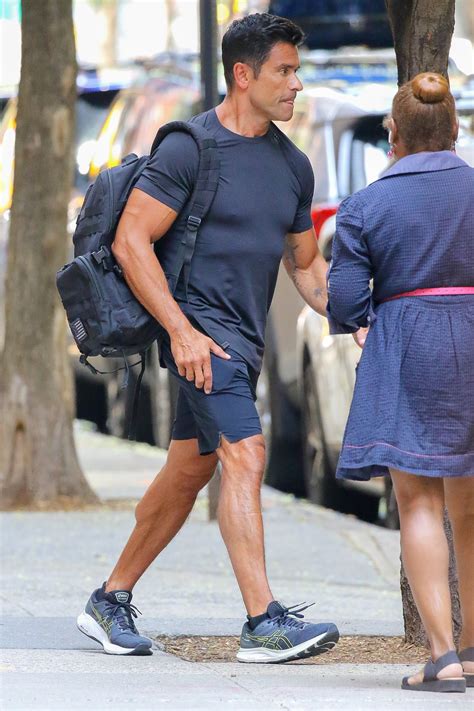 Live host Mark Consuelos shows off his massive muscles in tight gym