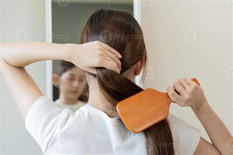 Health hair care, beauty makeup asian woman, girl holding hairbrush and