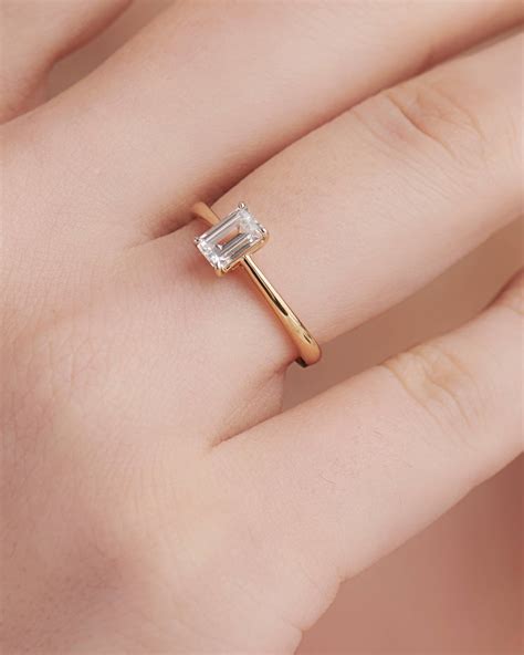 emerald cut diamond solitaire ring