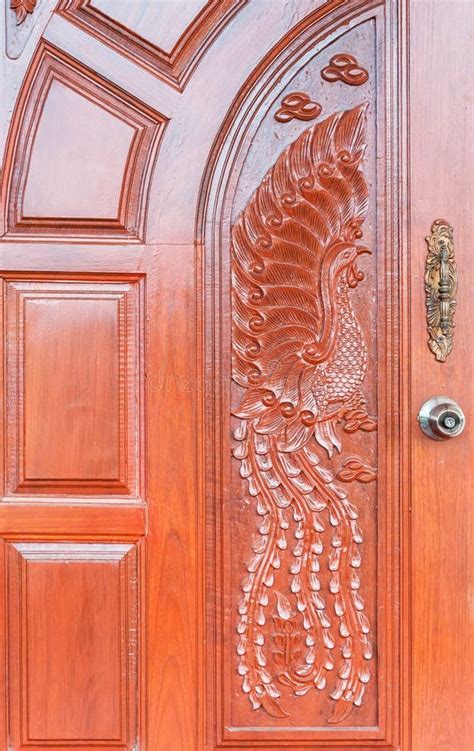 wooden door peacock design