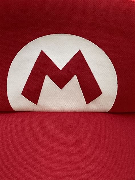 NINTENDO “MARIO” BROS. RED COSTUME CAP - Gem