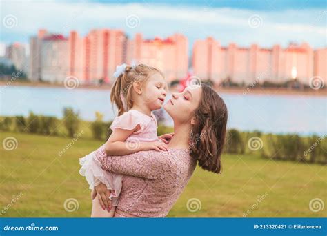 young girl   younger sister  enjoying life stock image