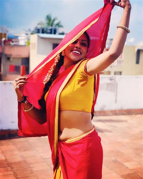 Sri Nikha hot stills in half saree - South Indian Actress