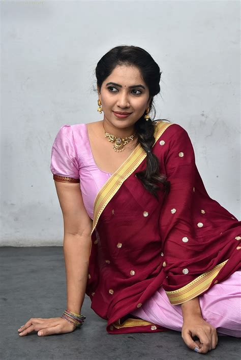 Anchor Indu hot stills in half saree - South Indian Actress