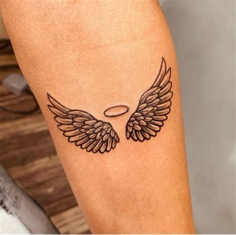 Angel tattoos | Angel tattoo for women, Wing tattoo men, Dope tattoos ...