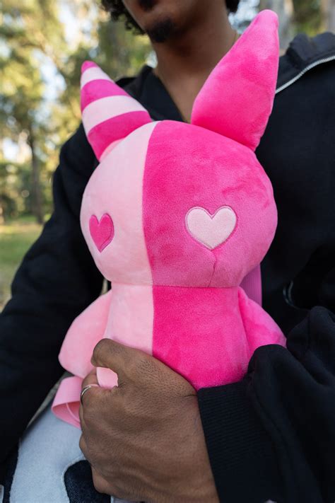 pink rabbit plush backpack  praying rabbit