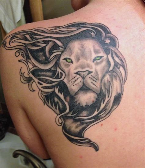 First tattoo! Lion tattoo, black and white tattoo, green eyes, lion ...