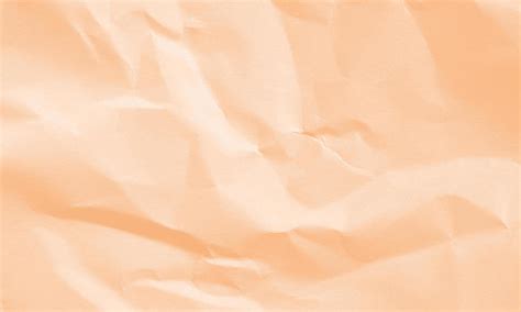 peach colored crumpled paper texture background  design decorative