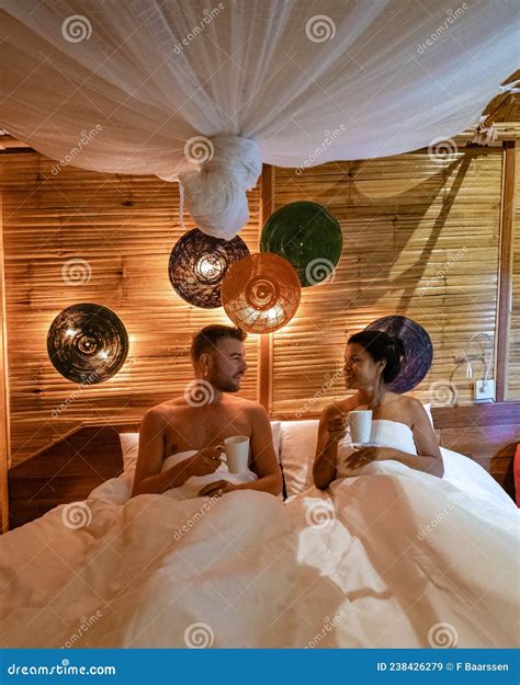 men and women on bed 1