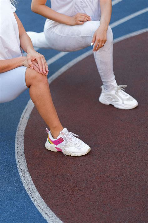 Women doing pilates workout in sport field · Free Stock Photo