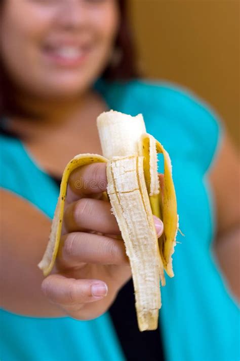 Young Woman Eating Peeled Banana Stock Photo - Image of healthy, beauty: 17471616