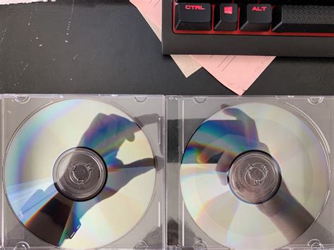 Fresh CD vs CD after burning some songs : r/mildlyinteresting
