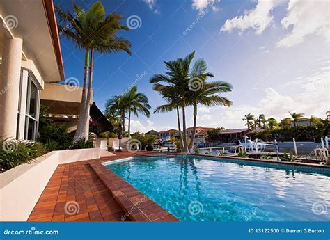 pool overlooking canal stock photo image  house boats