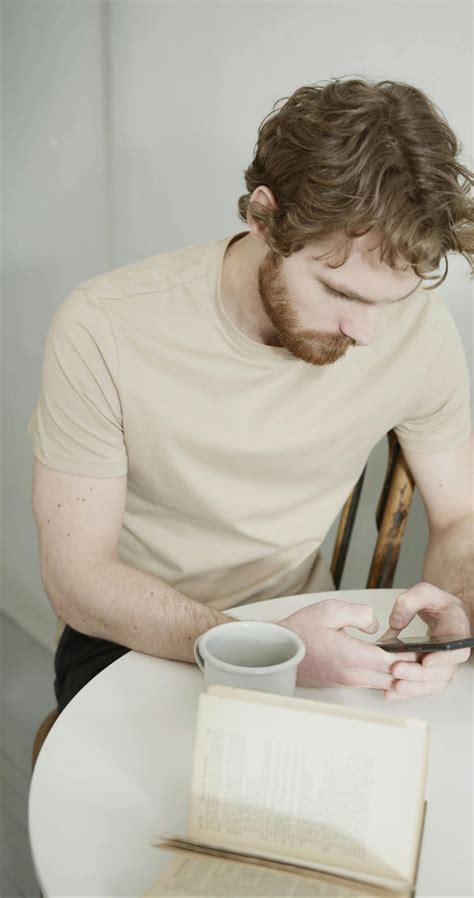 A Couple Ignoring Each Other While In A Dining Table · Free Stock Video