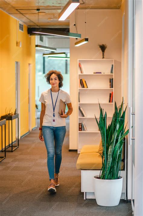 premium photo office worker walking   office corridor